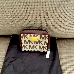 Michael Kors small wallet, see measurements, gently used.